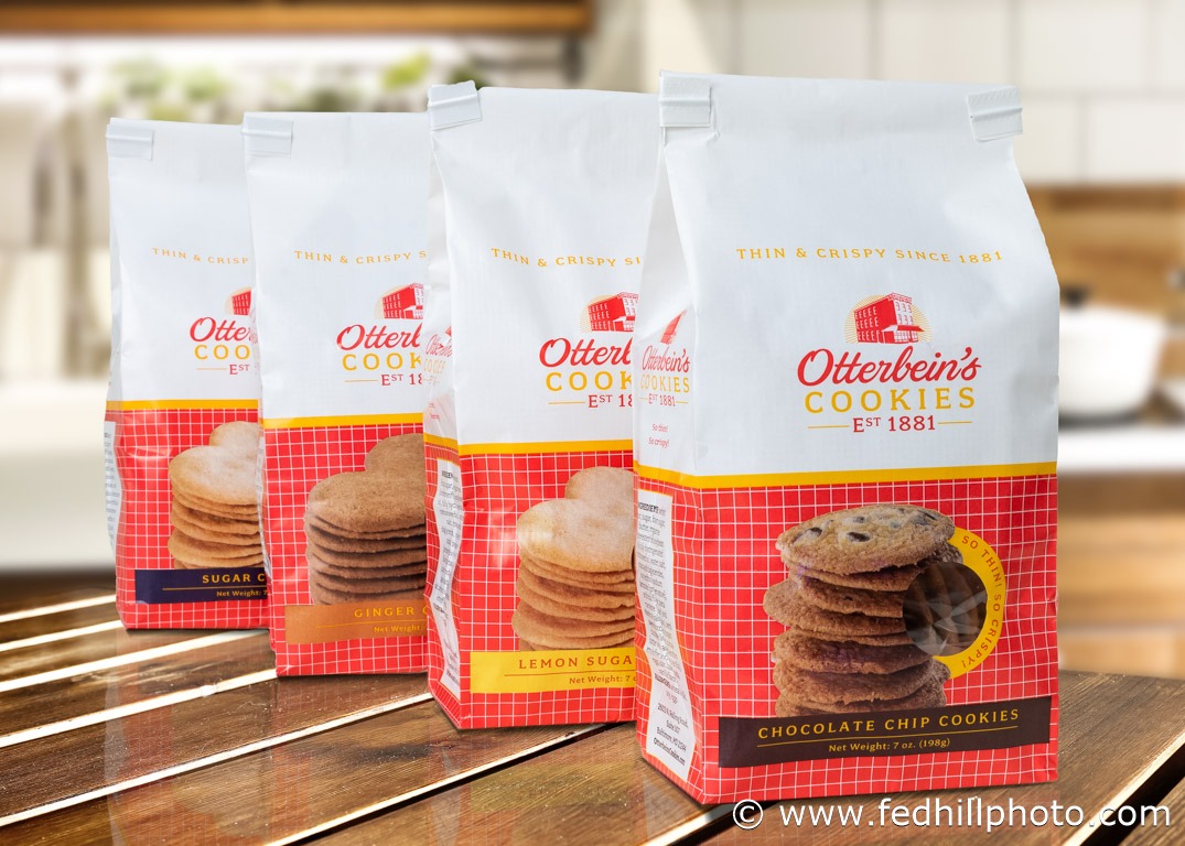 Product photo of bags of cookies on a kitchen counter.