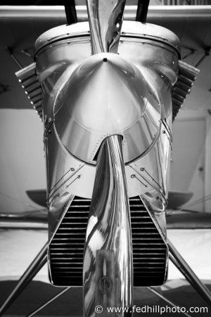 Black and white fine art photo of Curtiss F6C-1 Hawk military aircraft at National Museum of Naval Aviation.