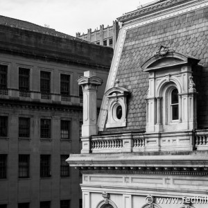 Black and white fine art photo of City Hall and Courthouse East, or Old Postal Service Building, in Baltimore, Maryland.