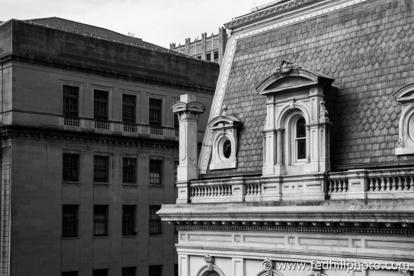 Black and white fine art photo of City Hall and Courthouse East, or Old Postal Service Building, in Baltimore, Maryland.