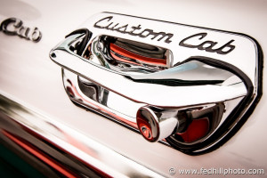 Fine art photo of an antique classic Ford F100 Custom Cab truck chrome door handle.