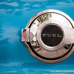 Fine art photo of an antique classic 1971 Dodge Challenger chrome fuel cap.