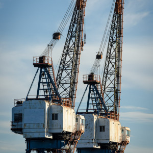 Fine art photo of industrial ship cranes in Locust Point, Baltimore, Maryland.