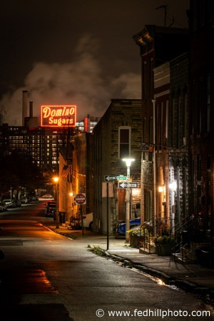 Fine art color photo of Domino Sugar Factory and Henry St from E Clement St at night, Baltimore, Maryland