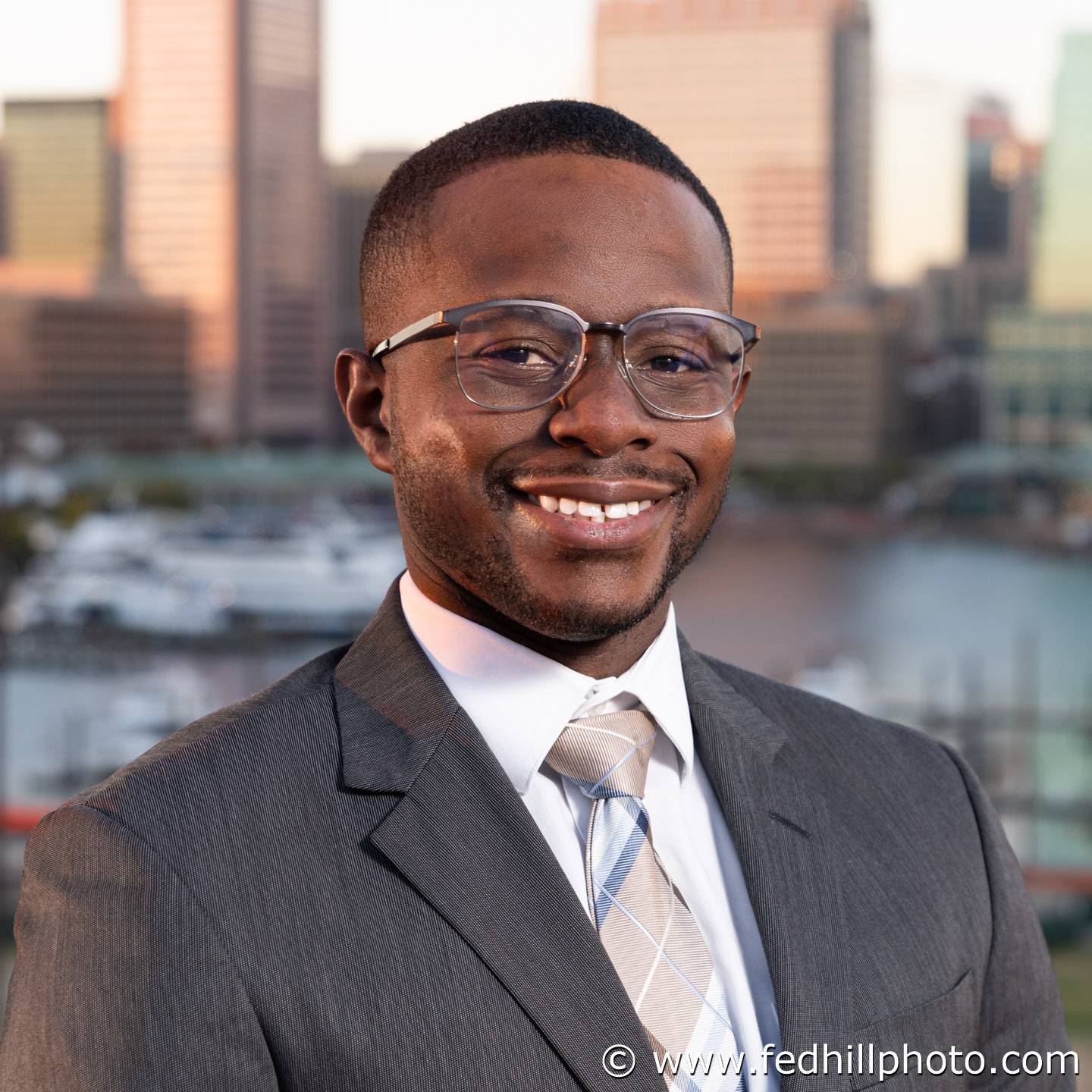 Professional environmental portrait headshot outside.